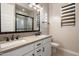 Bathroom featuring double sink vanity, sleek black hardware, and modern fixtures at 34801 N 53Rd St # 2, Cave Creek, AZ 85331