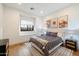 Bright bedroom featuring wood floors, a plush rug, and a window seat for a comfortable, stylish retreat at 3538 E Glenrosa Ave, Phoenix, AZ 85018