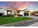 Charming single-story home with well-manicured lawn, black trim garage, and modern curb appeal at 3538 E Glenrosa Ave, Phoenix, AZ 85018