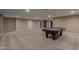 Large finished basement featuring a pool table and many access doors at 3768 S Coach House Dr, Gilbert, AZ 85297