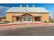 Community clubhouse with manicured landscaping and prominent address number welcomes residents and guests alike at 3768 S Coach House Dr, Gilbert, AZ 85297