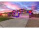 Festive single-story home illuminated with bright holiday lighting for a cheerful appearance at 3768 S Coach House Dr, Gilbert, AZ 85297