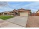 Beautiful single-Gathering home featuring a two-car garage and covered entryway at 3768 S Coach House Dr, Gilbert, AZ 85297