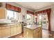 Well-lit kitchen with granite countertops, stainless steel appliances and hardwood floors at 3800 S Cantabria Cir # 1013, Chandler, AZ 85248