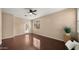 An empty bedroom with wood floors and a ceiling fan at 3872 E Flower St, Gilbert, AZ 85298