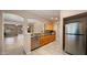 An open kitchen featuring stainless steel appliances and granite countertops at 3872 E Flower St, Gilbert, AZ 85298