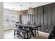 Dining room featuring a large table and stylish light fixtures at 4473 E Whitehall Dr, San Tan Valley, AZ 85140