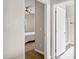 Hallway view showcasing a bedroom and a bathroom with modern fixtures at 4473 E Whitehall Dr, San Tan Valley, AZ 85140