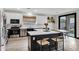 Well-lit kitchen with a large island, modern fixtures, and a view of the backyard at 4473 E Whitehall Dr, San Tan Valley, AZ 85140