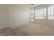 Bedroom boasts natural light, plush carpet, and ample space at 4552 E Chuckwalla Cyn, Phoenix, AZ 85044