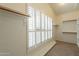 Spacious walk-in closet with built-in shelving and ample storage for an organized wardrobe at 4552 E Chuckwalla Cyn, Phoenix, AZ 85044