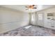 Bedroom featuring slate floors, pegboard and curtains over the window at 4725 E Brown Rd # 59, Mesa, AZ 85205