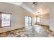 Bright living room featuring tile floors, high ceilings, and sliding glass doors leading to the outdoor space at 4725 E Brown Rd # 59, Mesa, AZ 85205