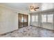 This sunroom features tiled floors, sliding glass doors, and natural light from the windows making this space shine at 4725 E Brown Rd # 59, Mesa, AZ 85205