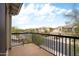 Community view from balcony with iron railing and brown concrete flooring at 5100 E Rancho Paloma Dr # 2024, Cave Creek, AZ 85331