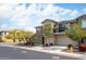 Beautiful two-story townhome with a balcony, two car garage, and lovely desert landscaping at 5100 E Rancho Paloma Dr # 2024, Cave Creek, AZ 85331