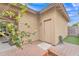 Charming backyard featuring a lemon tree, brick pavers, artificial grass, and access to additional storage at 5206 W Desert Hills Dr, Glendale, AZ 85304