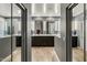 Elegant bathroom boasts modern fixtures and a sleek design, creating a serene atmosphere for personal care at 5210 E Danbury Rd, Scottsdale, AZ 85254