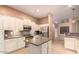 Bright eat-in kitchen with stainless appliances and tile backsplash at 6159 W Sequoia Dr, Glendale, AZ 85308