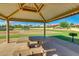 Picnic area featuring shaded tables, and a playground at 6159 W Sequoia Dr, Glendale, AZ 85308