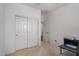 Neutral bedroom featuring carpeted floors, a closet and direct access to a bathroom at 7221 W Wood St, Phoenix, AZ 85043