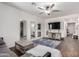 Bright living room with neutral paint, wood flooring and a ceiling fan for added comfort at 7221 W Wood St, Phoenix, AZ 85043