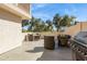 Inviting outdoor patio space with stylish seating and a modern BBQ grill at 7800 E Lincoln Dr # 1007, Scottsdale, AZ 85250