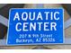 The Buckeye Aquatic Center sign showing the address at 815 E Centre Ave, Buckeye, AZ 85326