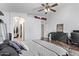 Calm bedroom with a ceiling fan and ample natural light at 815 E Centre Ave, Buckeye, AZ 85326