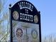 A welcome to Buckeye sign featuring emblems for the Lions Club and Rotary International at 815 E Centre Ave, Buckeye, AZ 85326