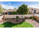 Landscaped backyard featuring lush green lawn and well-maintained greenery at 901 N Woodburne Dr, Chandler, AZ 85224