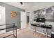 Bedroom/Office featuring sleek desk, gray walls, and minimalist decor at 901 N Woodburne Dr, Chandler, AZ 85224