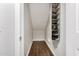 Walk-in closet featuring wood-look tile flooring and shoe storage at 901 N Woodburne Dr, Chandler, AZ 85224