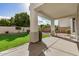 Covered patio with a view of the expansive green backyard at 901 N Woodburne Dr, Chandler, AZ 85224