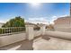 Outdoor patio with railings and views of neighboring houses at 901 N Woodburne Dr, Chandler, AZ 85224