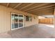 A covered back patio with sliding glass doors offers seamless indoor-outdoor living at 904 W Tulane Dr, Tempe, AZ 85283