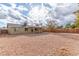 A large gravel backyard with a covered patio provides a low-maintenance outdoor space at 904 W Tulane Dr, Tempe, AZ 85283