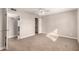 Neutral bedroom with plush carpet, ceiling fan, and closet at 904 W Tulane Dr, Tempe, AZ 85283