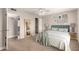 Cozy bedroom featuring carpet, ceiling fan, and decorative gallery wall at 904 W Tulane Dr, Tempe, AZ 85283