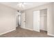 Bedroom featuring a closet with sliding doors and ceiling fan at 904 W Tulane Dr, Tempe, AZ 85283