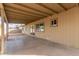 Covered back patio with concrete flooring, providing outdoor living space at 904 W Tulane Dr, Tempe, AZ 85283