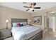 Cozy bedroom with a comfortable bed, soft lighting, and neutral color scheme at 908 E Cereus Pass, Queen Creek, AZ 85140