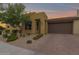 Beautiful single-story home with a desert-landscaped front yard and a two-car garage at 908 E Cereus Pass, Queen Creek, AZ 85140