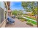 Outdoor seating includes a table and sofa on the patio to create a comfortable and inviting spot to relax and enjoy the outdoors at 908 E Cereus Pass, Queen Creek, AZ 85140