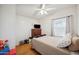 Simple bedroom with a comfortable bed and natural light, creating a peaceful retreat at 97 W Marilyn Way, San Tan Valley, AZ 85140