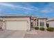 Charming single-story home with a two-car garage and a well-maintained desert landscape at 10332 W Potter Dr, Peoria, AZ 85382