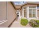 Inviting front entrance with a decorative security door, large windows, and desert landscaping at 10332 W Potter Dr, Peoria, AZ 85382