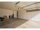 A spacious two car garage with built in cabinets for storage at 10332 W Potter Dr, Peoria, AZ 85382