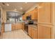 Kitchen with stainless steel appliances, granite countertops and ample wooden cabinetry and tile flooring at 10332 W Potter Dr, Peoria, AZ 85382