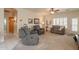 Bright and airy living room with neutral paint, comfortable seating, and natural light at 10332 W Potter Dr, Peoria, AZ 85382